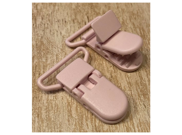 Clip bretelle plastique rose sucette, bretelle