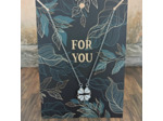 Collier avec pendentif magnétique trèfle à quatre feuilles