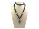 Collier avec pendentif croix en hématite