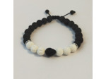 Bracelet ajustable pierre de lave noir&blanc, tête de mort howlite noire