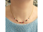 Tour de cou chaîne et perles tons rouge