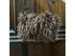 Sac en fourrure Le voyage en panier