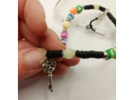Bijou de portable noir et multicolore "THE BEST FRIEND"