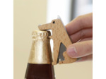 Chien décapsuleur