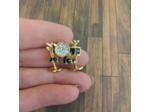 Broche batterie noir et strass