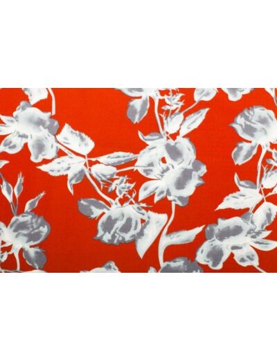 Tissu motif fleur sur fond rouge