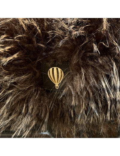 Sac en fourrure Le voyage en panier