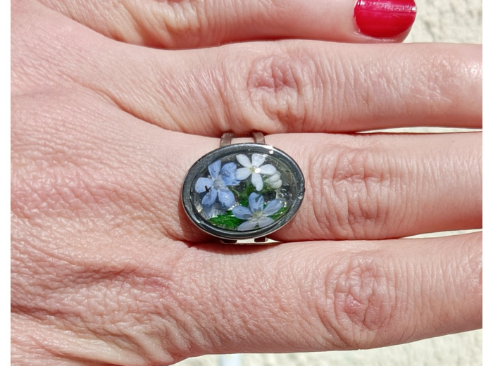 Bague résine ovale argenté fleur bleu #20