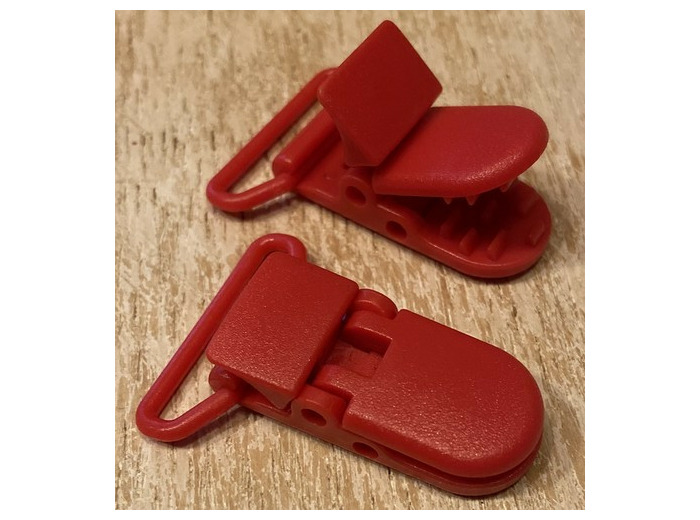 Pince bretelle plastique rouge sucette, bretelle