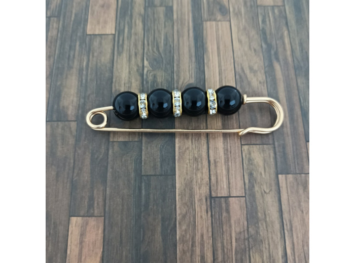 Broche perles noires