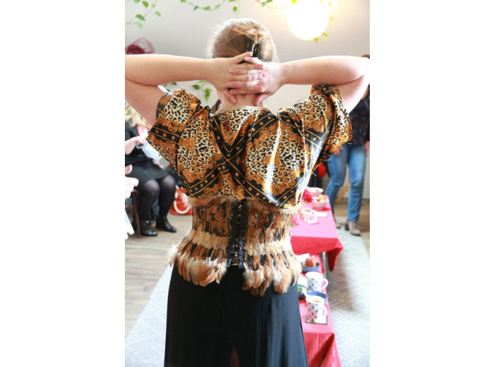 Serre-taille en plumes de coq roux