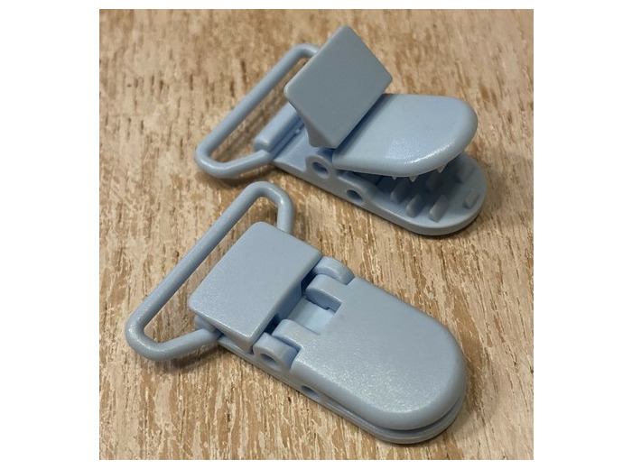 Pince bretelle plastique bleu ciel sucette, bretelle