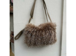 Pochette en Fourrure Le Voyage en Panier