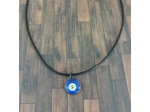 Pendentif œil porte bonheur sur cordon noir