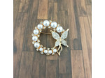 Broche couronne papillon