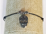 Bracelet élastique argenté/noir/tête de mort
